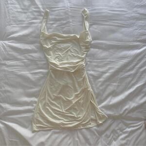 Tresser White cream mini dress with open back